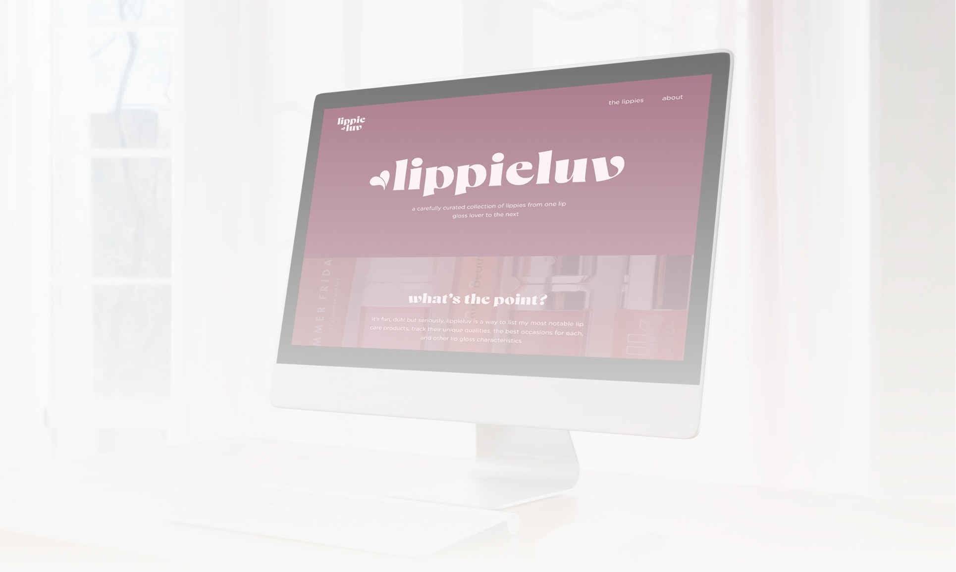 desktop monitor displaying lippiluv website design with a white overlay
